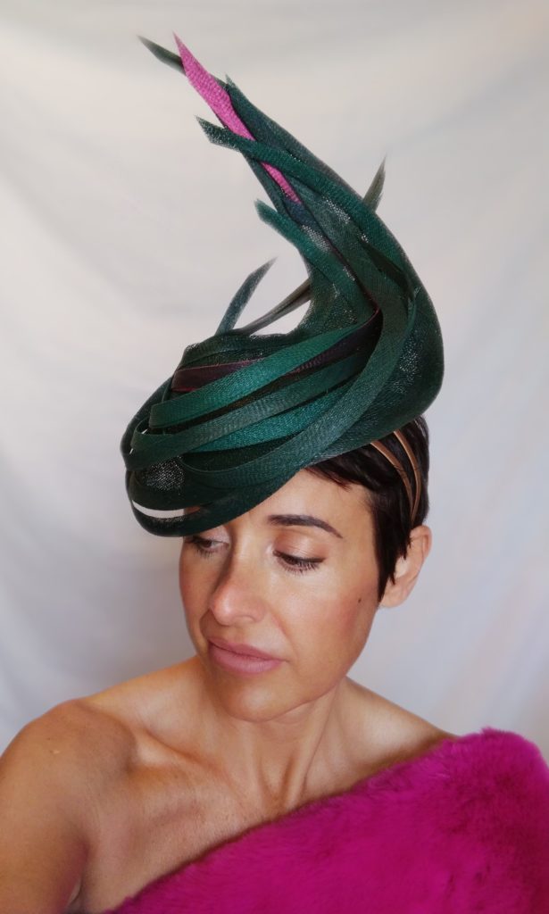 Green Feather hat by Sara Camps